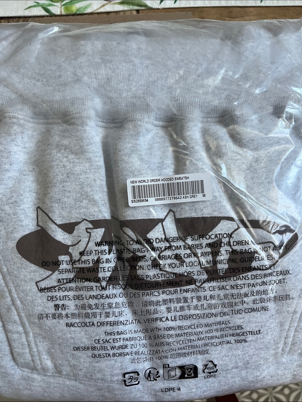 Supreme Ash Grey Hoodie with Black Graphic
No photo of back unopened package